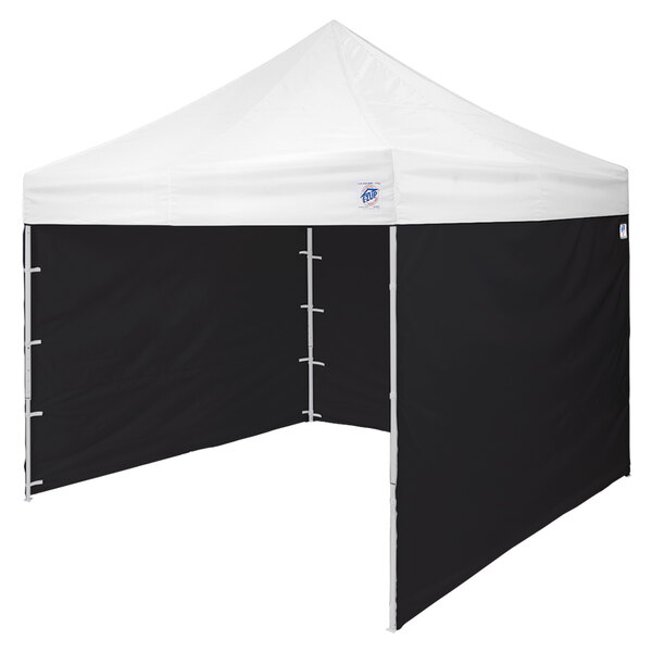 A black E-Z Up canopy sidewall with a white door.