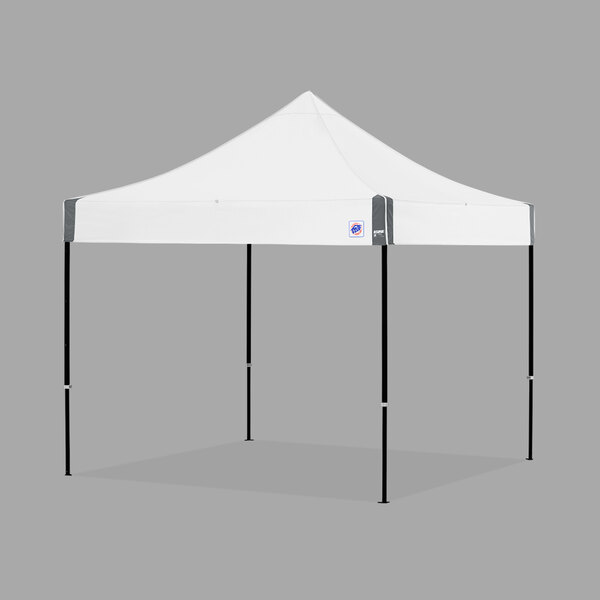 A white E-Z Up canopy with black poles.