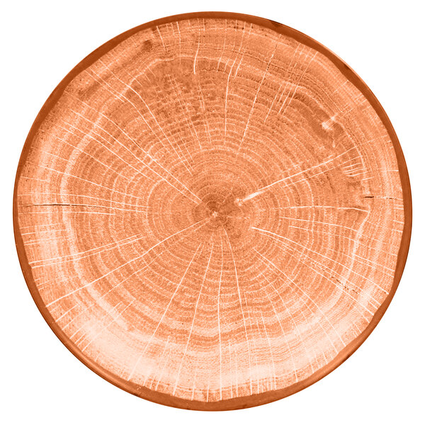 A close up of a tree stump with a circular cut out in the center.