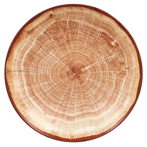 a circular wood plate with a white border