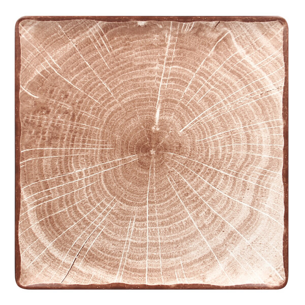 A square walnut brown porcelain plate with a circular pattern on the inside.