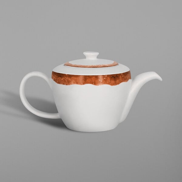 A white teapot with a brown stripe.