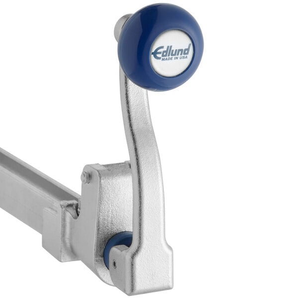 An Edlund #2 manual can opener with a blue metal handle and a silver metal knob.