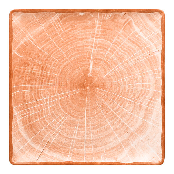 A square RAK Porcelain plate with a wood pattern and orange circle.