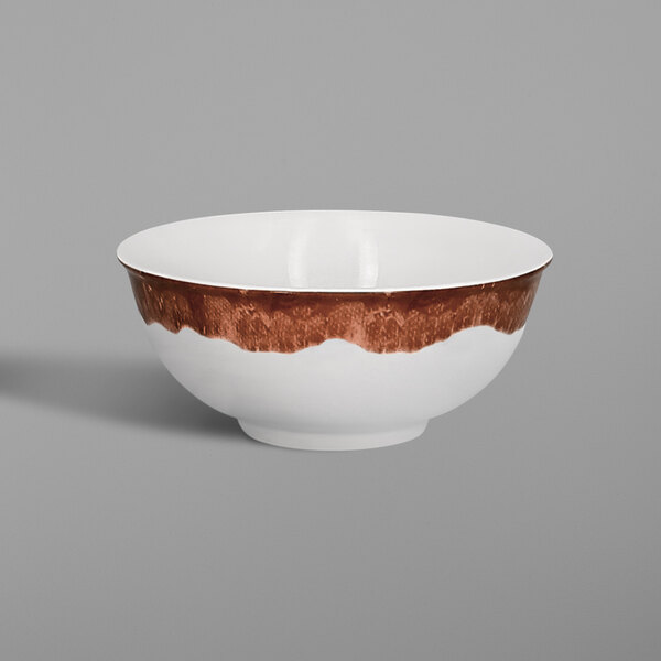 A white porcelain bowl with a brown rim.