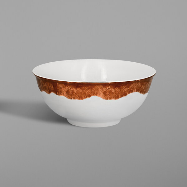 A white RAK Porcelain bowl with brown and white stripes.