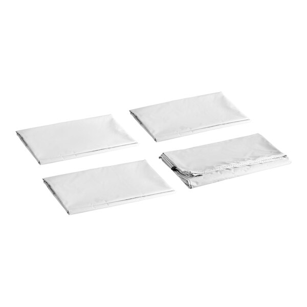 A set of four folded silver canopy wall panels for a 10' x 10' tent.