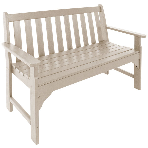 a white bench with armrests