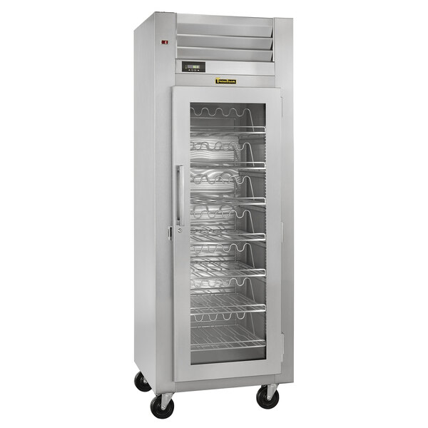 A Traulsen wine refrigerator with a glass door and shelves.