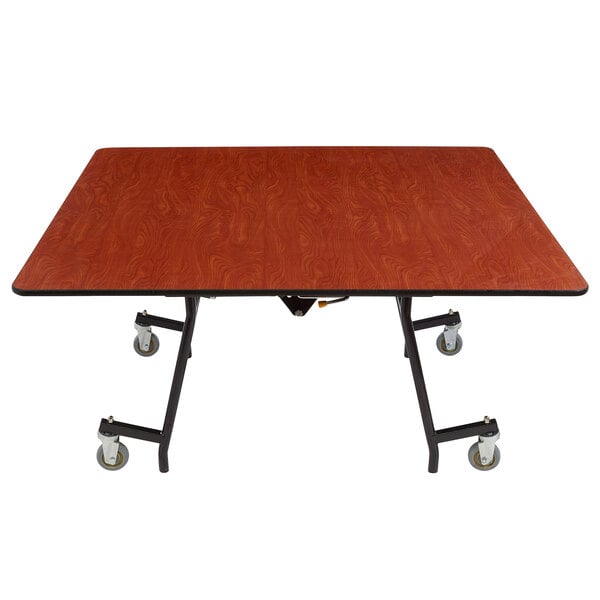 A National Public Seating square cafeteria table with a wood surface and T-mold edge.