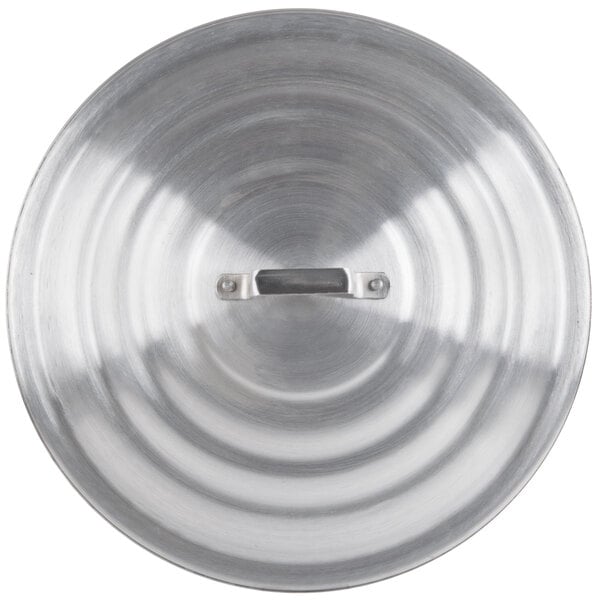 A close up of a Town 20" Aluminum Steamer Cover.