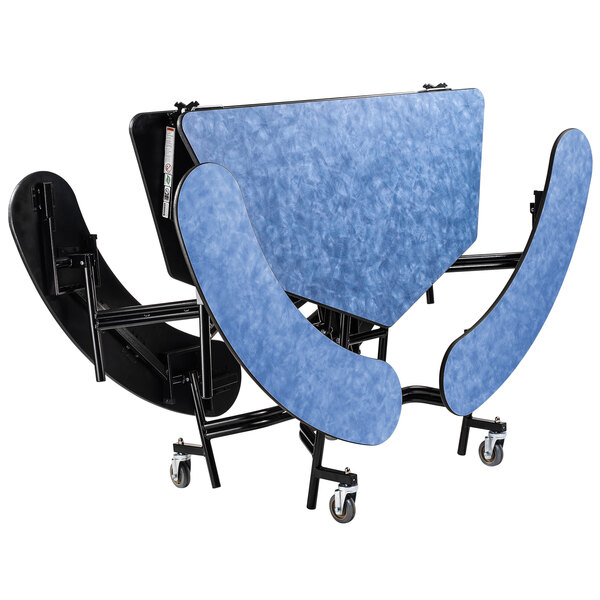 A blue National Public Seating octagonal table with black wheels.