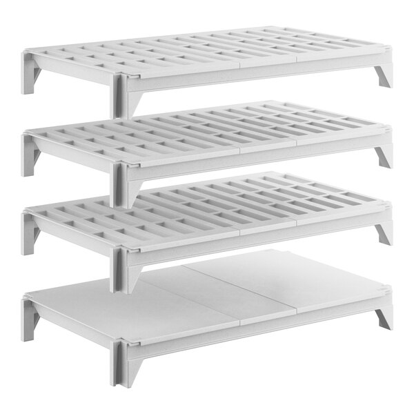 A set of four white shelving units, including three vented shelves and one solid shelf, designed for stationary storage.