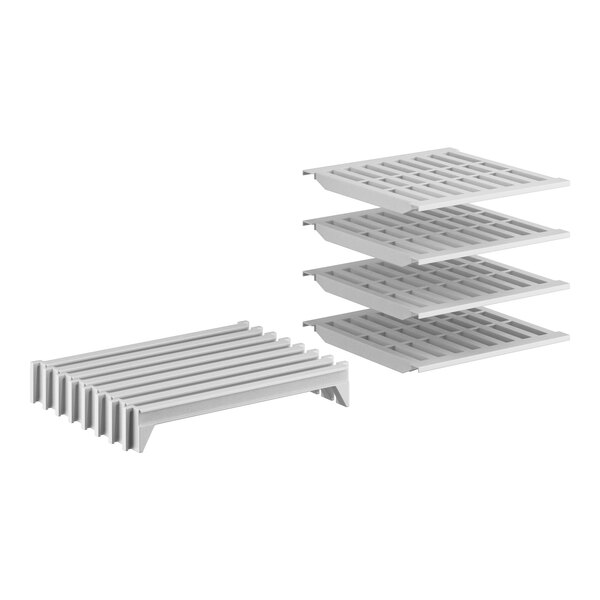 A white plastic Camshelving stationary shelf kit with vented shelves.