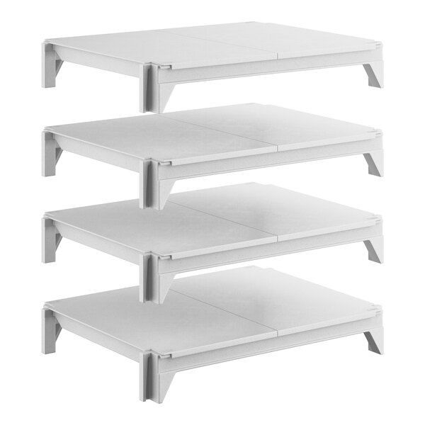 A set of four solid, rectangular, white stationary shelving units designed for storage.