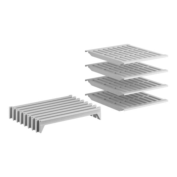 A white plastic Cambro Camshelving stationary shelf kit with 4 vented shelves.