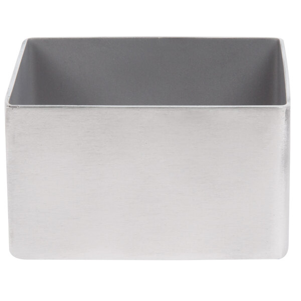 An American Metalcraft stainless steel rectangular sugar caddy with a grey lid.