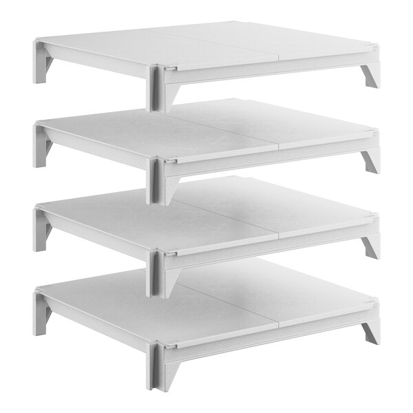 A set of four solid, rectangular, white stationary shelving units designed for storage.