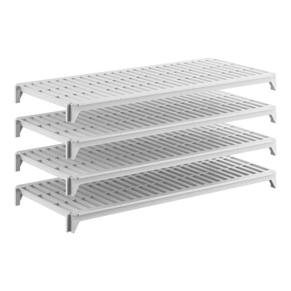 A set of four white vented plastic shelving units designed for stationary storage.