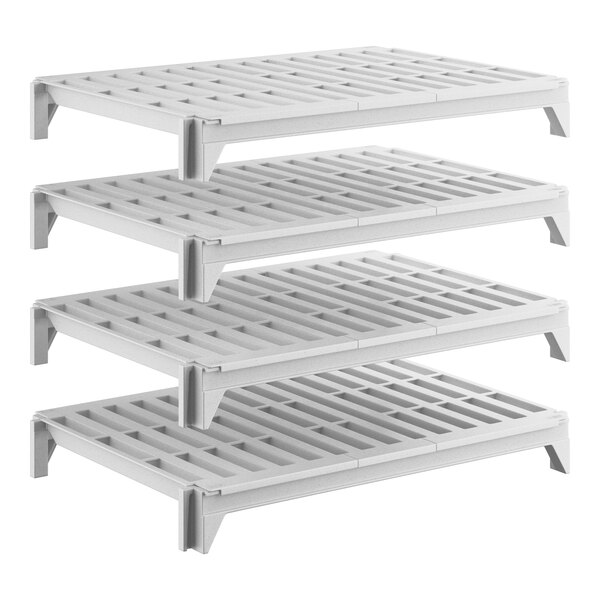 A set of four vented, rectangular plastic shelving units designed for stationary storage.