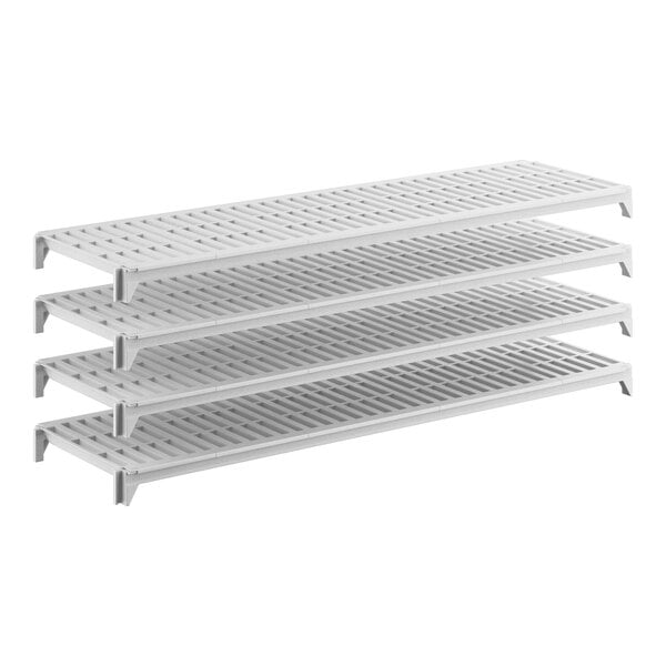 A set of four white vented stationary shelving units designed for storage and organization.