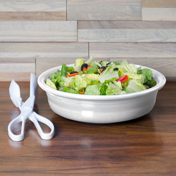 a bowl of salad on a table