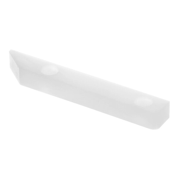 A white plastic rectangular bumper with holes.
