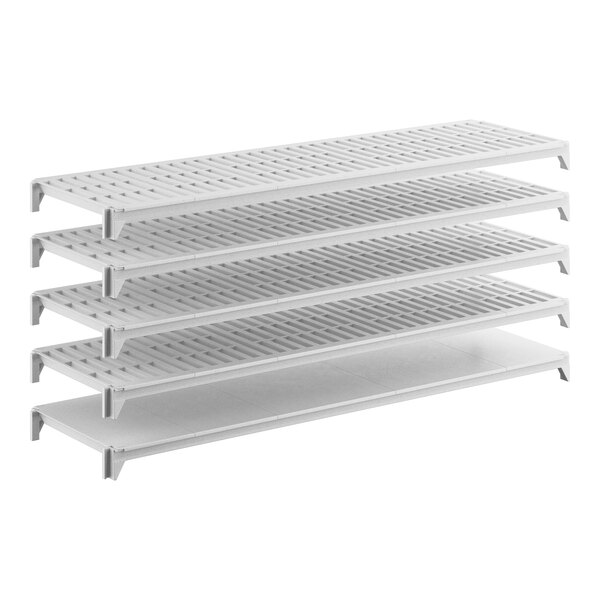 A white stationary shelving kit with four vented shelves and one solid shelf.