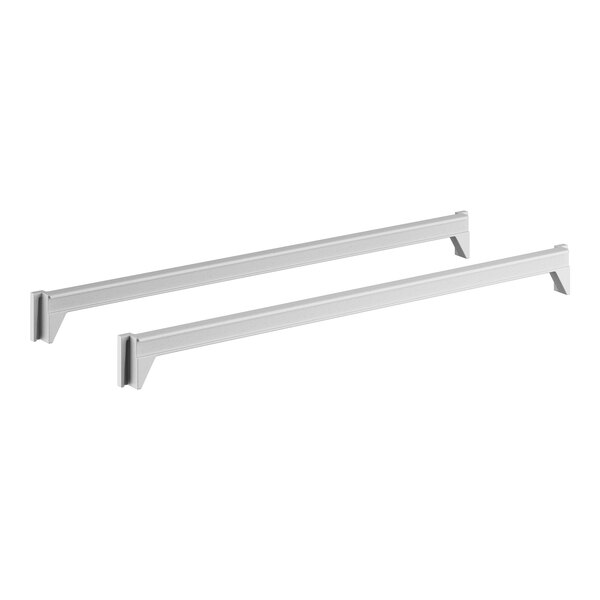A pair of white metal bars.