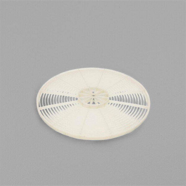 A white plastic circular wheel with a hole in the center and spokes.