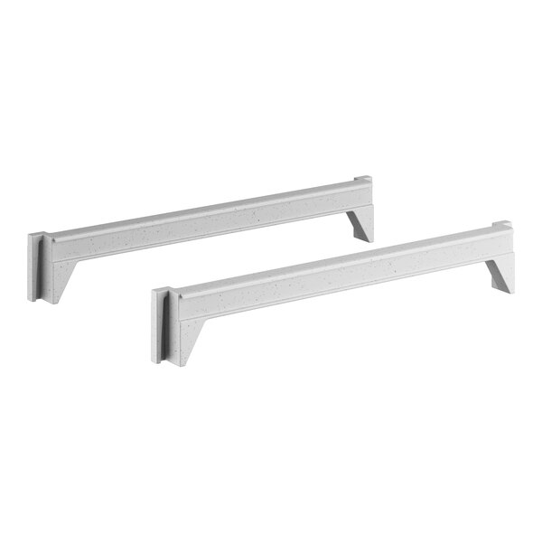 A pair of white metal Cambro shelf traverses.