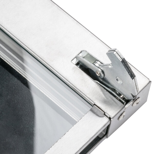 The replacement door for an Avantco CO-28 convection oven, a metal box with a latch on it.