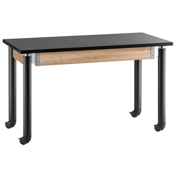 A black National Public Seating science lab table with metal legs and wheels.