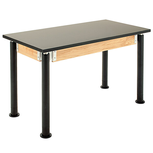 A black National Public Seating science lab table with black legs and a black top.