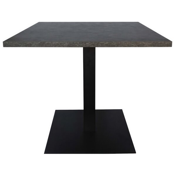 A Grosfillex dark grey square concrete table top on a black table base.
