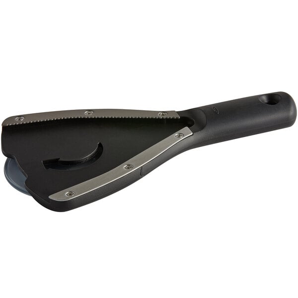 A black and silver OXO Good Grips handheld jar opener with a black base pad.