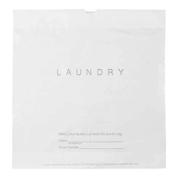 A white plastic bag labeled 'LAUNDRY' with spaces to write a name and room number.