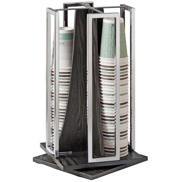 A Cal-Mil Cinderwood cup and lid holder with paper cups on a table.