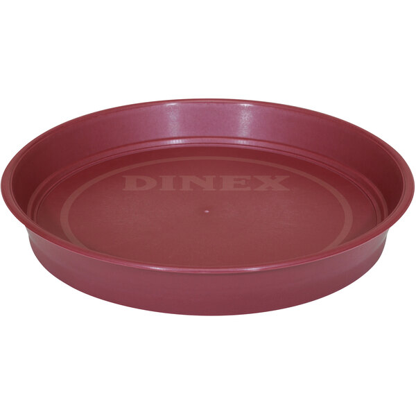 A red plastic pan with a lid.