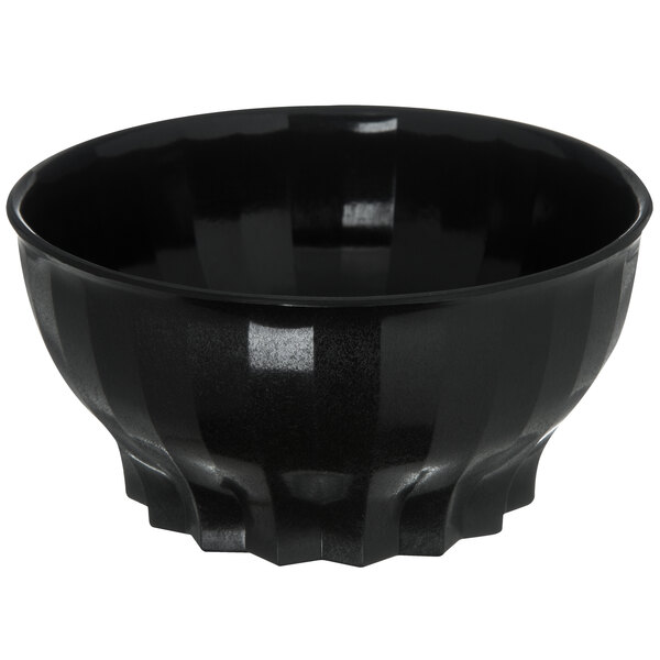 A black Dinex Tropez convection bowl with wavy edges.
