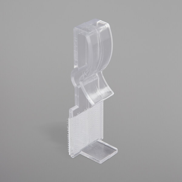 A clear plastic clip with hook and loop attachment.