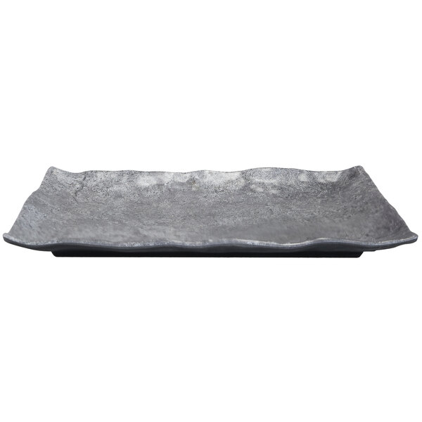 A rectangular Elite Global Solutions coal melamine plate with wavy edges.