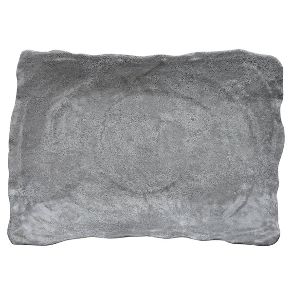 A grey rectangular melamine bowl with a white border.