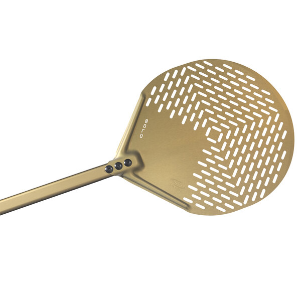 A close-up of a GI Metal gold anodized aluminum round perforated pizza peel with a long handle.
