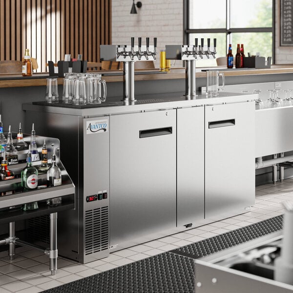 An Avantco stainless steel beer dispenser with four taps.