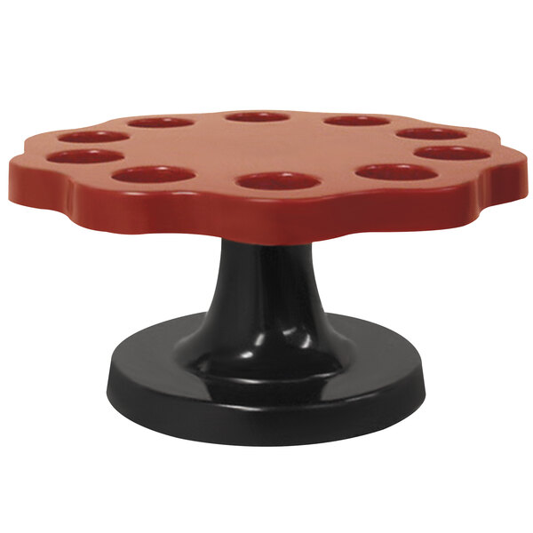 A red and black Thunder Group sushi hand roll rack.