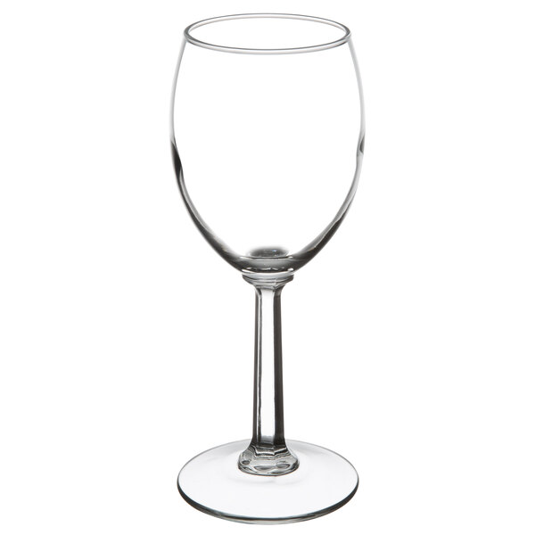 A close-up of a clear Libbey tall wine glass with a stem.