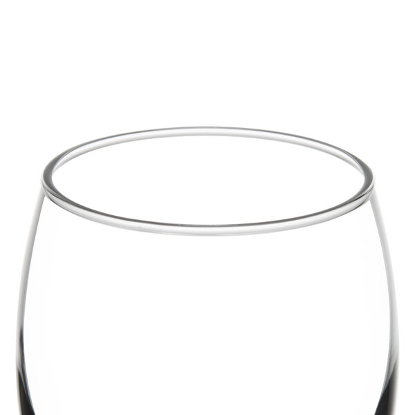 A close up of a Libbey Napa Country tall wine glass with a white background and a rim.