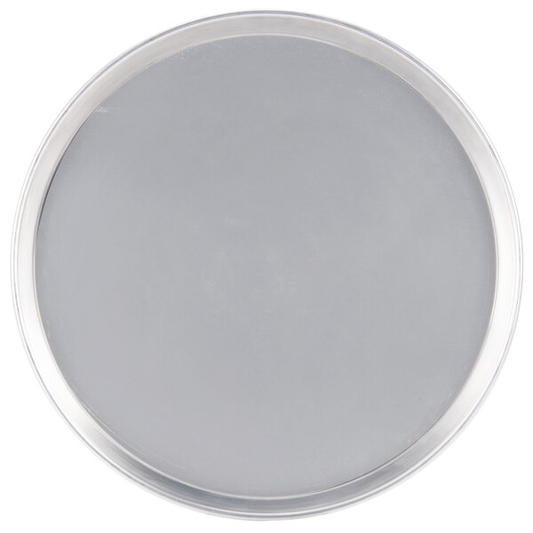 An American Metalcraft heavy weight aluminum deep dish pizza pan with a white background.