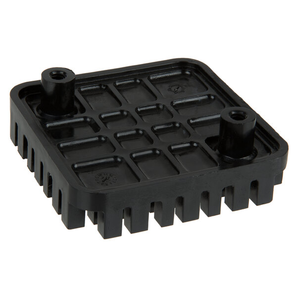 A black plastic object with holes.